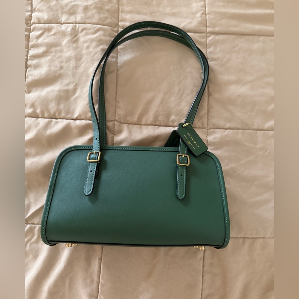 Green coach swing zip